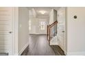 Bright entryway features hardwood floors, staircase and an open floor plan at 404 Westmarch Cir # 284A, Loganville, GA 30052