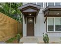 Close-up of the front door entrance, showing the modern design and covered entryway at 101 Fairfield Nw Pl, Atlanta, GA 30314
