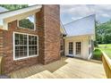 The home offers a spacious back deck ideal for outdoor dining, relaxation, and entertaining at 110 Chardonnay Oaks Dr, Mcdonough, GA 30252