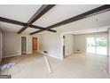 Open-concept living area with wood floors and access to multiple rooms at 2282 Belmont Dr, Decatur, GA 30032