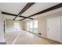 Spacious living area featuring new floors, large windows, and ample natural light at 2282 Belmont Dr, Decatur, GA 30032