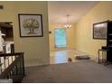 Bright living room adjacent to dining area perfect for entertaining guests at 6875 Timberclair Ct, Lithonia, GA 30058