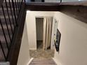 View down the carpeted stairs to the basement at 6875 Timberclair Ct, Lithonia, GA 30058