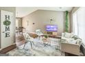 Bright living room with modern furnishings, hardwood floors, and contemporary décor at 447 Sherwood Cir, Stone Mountain, GA 30087