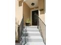 Charming front entrance with stairs and iron railings at 1252 Heritage Dr, Villa Rica, GA 30180