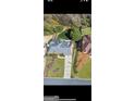 An aerial view of a home in a landscaped yard with mature trees at 710 Larkspur, Acworth, GA 30102