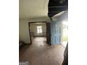 Renovator's opportunity with this expansive living room showing great natural light potential at 1597 Joseph E Boone Nw Blvd, Atlanta, GA 30314