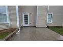 The backyard is highlighted by a small concrete patio area, perfect for relaxing at 705 Mustang Ct, Hampton, GA 30228