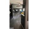 View of a sleek kitchen that leads to an open area at 491 Allana Ct, Stone Mountain, GA 30087