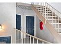 Condo entrance features stairs, access to units, and fire extinguisher for safety at 843 Seasons Pkwy, Norcross, GA 30093