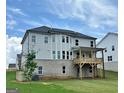 New construction home with two-story deck and large back yard space at 683 Edgar, Hampton, GA 30228
