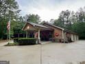 Unique multi-car garage building with vintage decor and ample space at 7970 Berea Rd, Winston, GA 30187