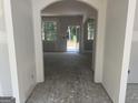 Spacious living room with arched doorways and natural light, ready for customization at 5565 Hwy 155, Stockbridge, GA 30281