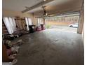 Spacious two car garage featuring an open door and storage space at 145 Mill Run, Fayetteville, GA 30214
