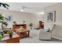 Bright living room with neutral tones, cozy seating, and stylish decor creating a welcoming atmosphere at 183 Wynnmeade, Peachtree City, GA 30269