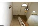 Traditional staircase with carpet and classic railing leading to upper floors at 3336 Harvester Woods Rd, Decatur, GA 30034