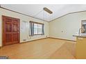 A open living room with wood floors at 207 Conkle Rd, Hampton, GA 30228