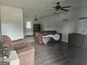 Spacious living room with new floors, perfect for relaxation and entertaining at 443 Walker St, Villa Rica, GA 30180