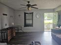 Inviting living room showcasing a large window and neutral walls at 443 Walker St, Villa Rica, GA 30180