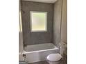 Updated bathroom with a tiled shower and new fixtures at 90 Pat Mell Sw Rd, Marietta, GA 30060