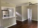 Open-concept living area with beautiful hardwood floors and lots of natural light at 90 Pat Mell Sw Rd, Marietta, GA 30060