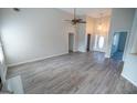 Bright and airy living room featuring modern flooring and a neutral color palette at 609 Alyssa Ct, Locust Grove, GA 30248