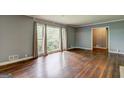 Inviting living room featuring gleaming hardwood floors and lots of natural light at 2742 Highway 20 W, Hampton, GA 30228