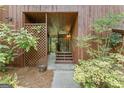Covered entrance featuring a lattice screen and stone flooring at 1677 Terrell Ridge Se Dr, Marietta, GA 30067