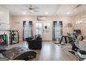 Bright living room with hardwood floors, neutral walls and ceiling fan at 1848 Eastmore Ave, Conyers, GA 30094