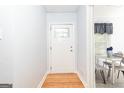 Bright entryway featuring a hardwood floor and decorative glass front door at 650 Lynhurst Sw Dr, Atlanta, GA 30311