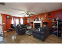 Inviting living room with hardwood floors, a fireplace, and comfortable seating at 860 Sweet Mill Ln, Lawrenceville, GA 30045