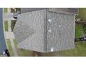 Aerial view showcasing a well-maintained roof of a residential property, surrounded by trees at 241 Balaban Cir # 241, Woodstock, GA 30188
