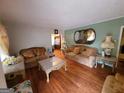Bright living room with hardwood floors, classic decor, and ample space for comfortable seating at 1712 Clifton Se Way, Atlanta, GA 30316