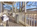 Relaxing outdoor balcony with a charming porch swing and scenic views at 692 Kirkwood Se Ave # A, Atlanta, GA 30316