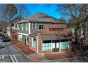 Beautiful side view of the exterior showing the brick section and adjacent gray siding at 692 Kirkwood Se Ave # A, Atlanta, GA 30316