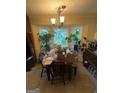 Dining room with plants and boxes on the table at 2663 Shiloh Hills Ct, Snellville, GA 30039