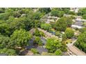An aerial view showcases residences with beautiful green spaces, swimming pool and parking at 32 Ivy Ne Pkwy, Atlanta, GA 30342