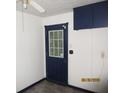 White room with door and light colored floor at 4350 Lincolndale Dr, Ellenwood, GA 30294