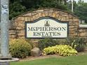 Stone sign marking the entrance to McPherson Estates at 4199 Elderberry Nw Dr, Acworth, GA 30101