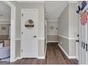 Inviting foyer with wood floors and neutral paint at 127 Rockspray Rdg, Peachtree City, GA 30269