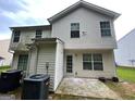 Back exterior of home with siding and air conditioning units at 737 Outlook Way, Atlanta, GA 30349