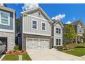 Charming two-story home with stone accents and a two-car garage in a well-manicured community at 376 Lakeside Ct, Canton, GA 30114