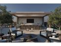 Inviting rooftop terrace with bar, grill, and comfortable seating area, perfect for entertaining at 318 Sandy Springs Cir # 110, Atlanta, GA 30328