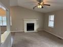 Bright living room with a fireplace and ceiling fan at 46 Leland Sw Dr, Mableton, GA 30126