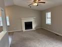 Living room with fireplace, neutral walls, and carpet at 46 Leland Sw Dr, Mableton, GA 30126