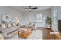 Bright and airy living room with plush seating, stylish decor, and lots of natural light at 3159 Nursery Se Rd, Smyrna, GA 30082