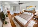 Bedroom featuring hardwood floors, fresh paint, closet and ensuite access at 3159 Nursery Se Rd, Smyrna, GA 30082