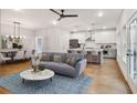 Open floor plan with modern kitchen, dining area, and living space at 522 Pierce Nw Ave, Atlanta, GA 30318