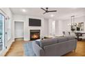 Cozy living room features a fireplace, wood floors, and natural light at 522 Pierce Nw Ave, Atlanta, GA 30318