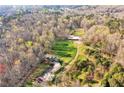 Aerial view showcasing home, barn, and expansive property at 450 Pat Rich Dr, Canton, GA 30115